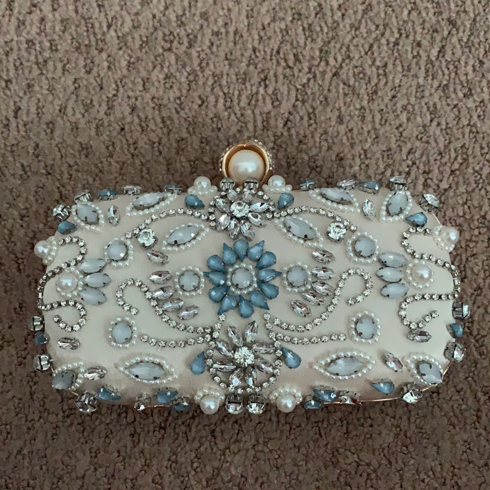 Blush pink clutch bag